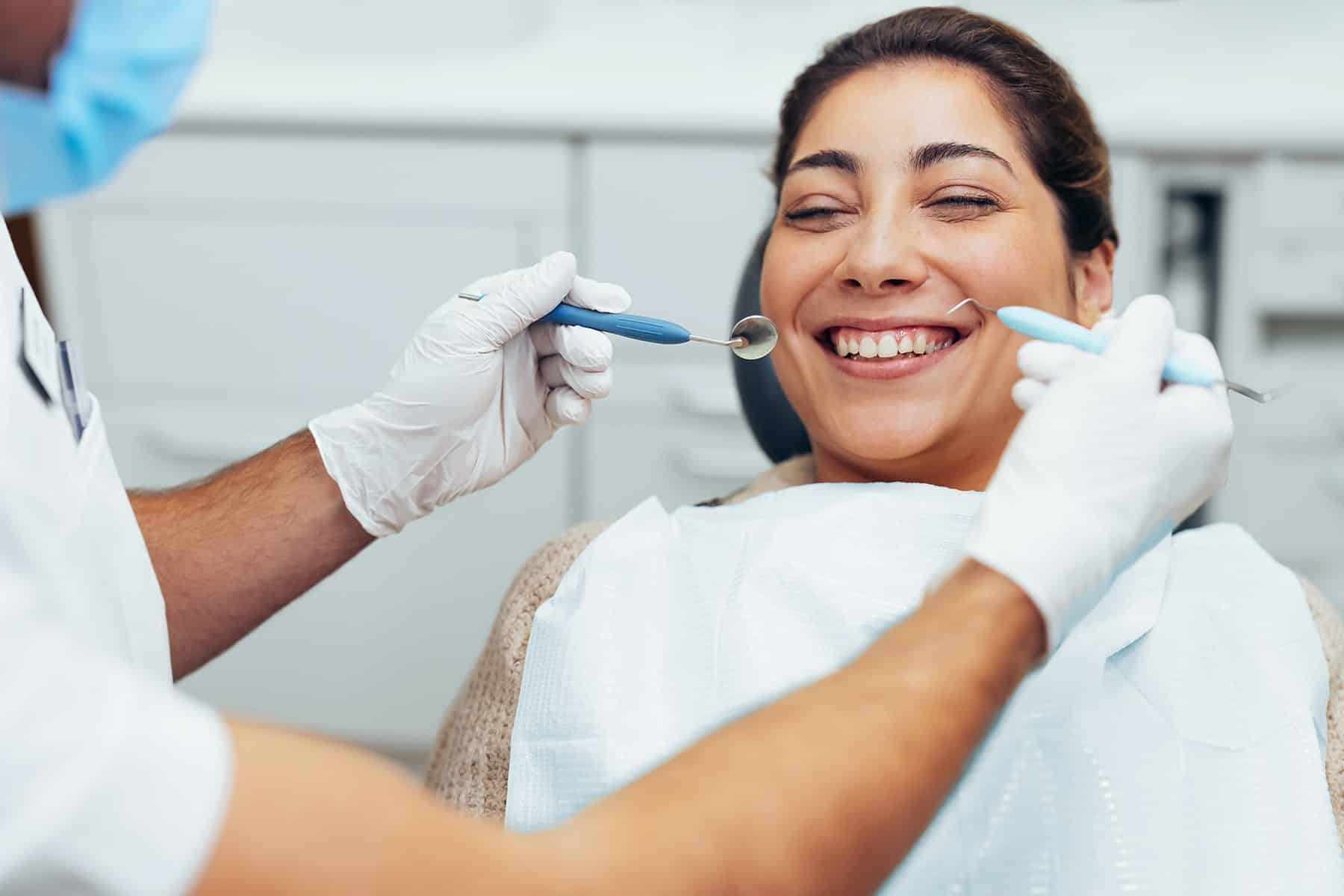 Woman at a preventive dentist appointment in Chesterfield, MI