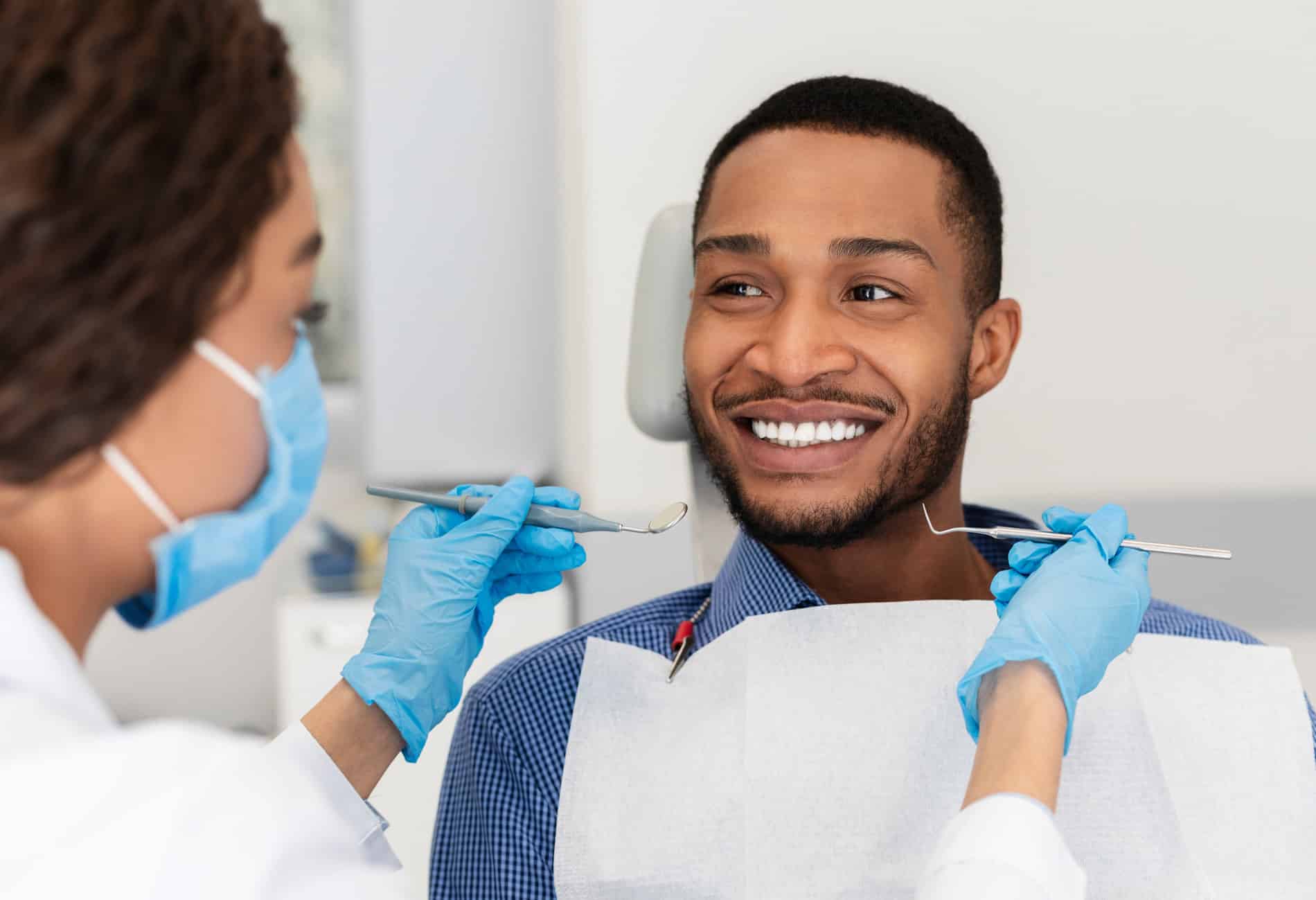 man at his routine dental exam in Chesterfield MI